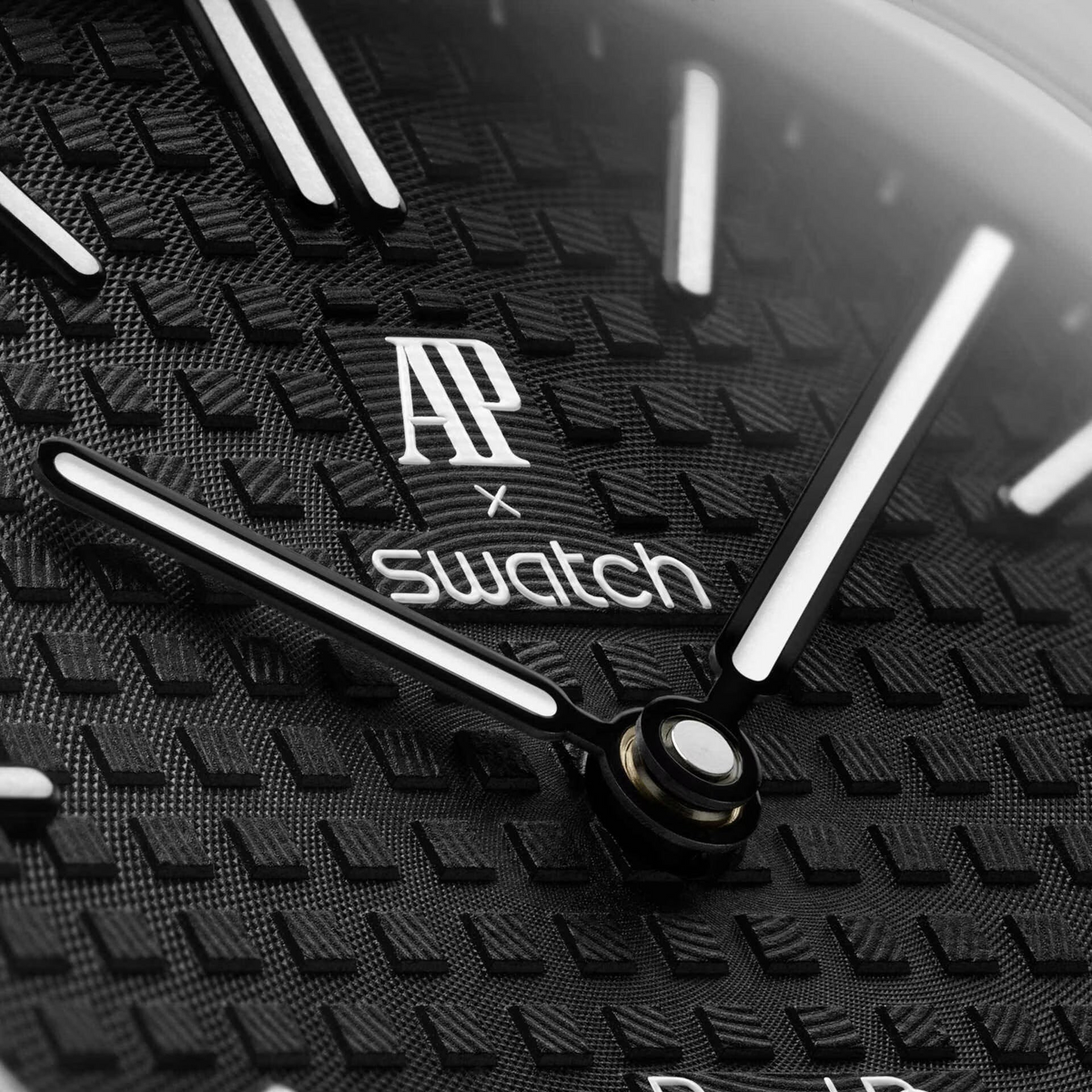 JeevzPlug AP x Swatch Royal Pop Ocho Negro black bioceramic watch dial with iconic textured pattern and branding