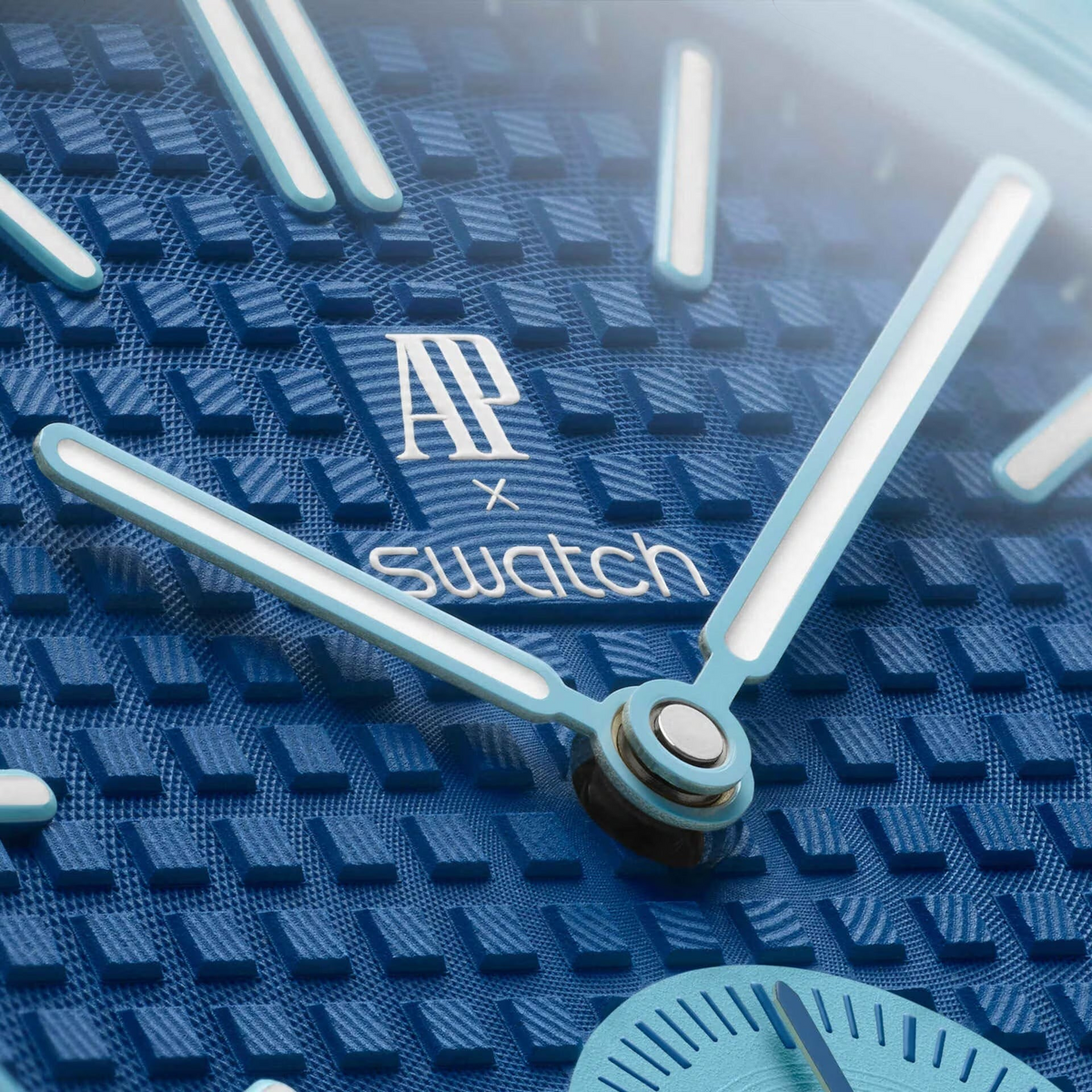 JeevzPlug AP x Swatch Royal Pop LAN BA blue bioceramic watch dial with iconic textured pattern and branding