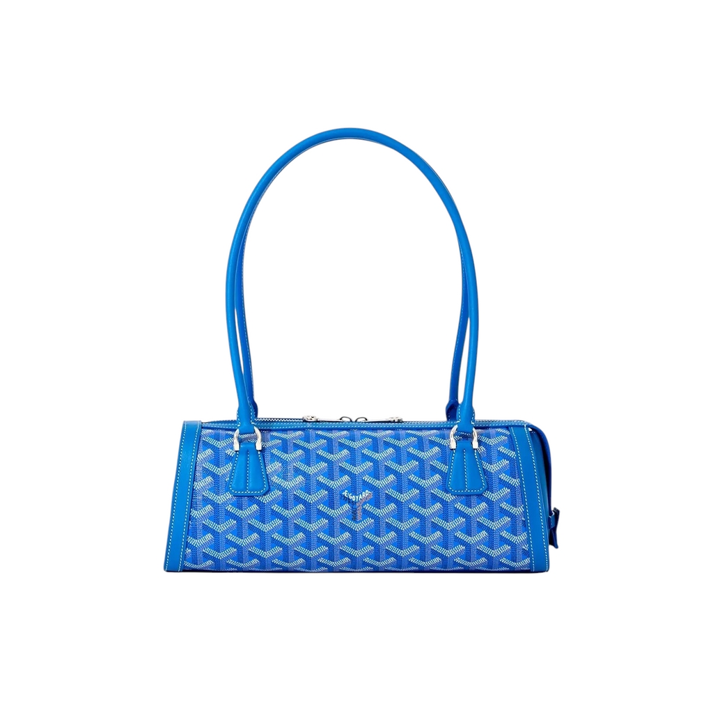 JeevzPlug Goyard blue Goyardine canvas bucket bag with leather trim and shoulder strap against a white background.