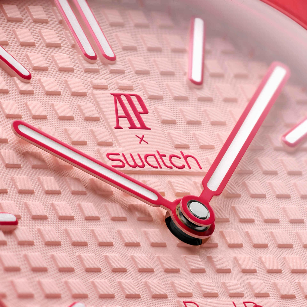 JeevzPlug AP x Swatch Royal Pop Otto Rosso watch dial featuring a textured light pink pattern and red hands.