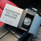 JeevzPlug Swatch x Omega Bioceramic Moonswatch Mission to the Moon watch in its branded presentation box