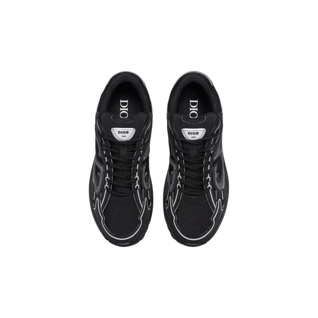 JeevzPlug Dior B30 sneakers in black mesh and technical fabric with reflective CD30 signatures and rubber outsole.