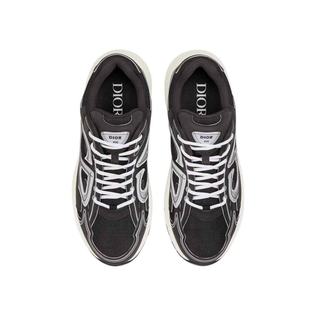 JeevzPlug Dior B30 sneakers in black mesh and technical fabric with reflective CD30 signatures and white laces.