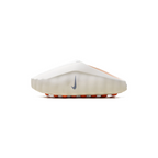 JeevzPlug Nike Mind 001 Slide in Light Bone featuring a minimalist sculpted upper and orange textured outsole