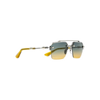 JeevzPlug Chrome Hearts Bidi Esem sunglasses with pewter frames, rimless gradient lenses, and translucent malt tips.
