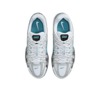 JeevzPlug Nike P-6000 Dusty Cactus sneakers in white, metallic silver, and teal with a breathable mesh layered design.
