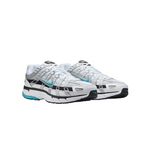 JeevzPlug Nike P-6000 Dusty Cactus sneakers featuring white mesh, silver overlays, and teal accents in a retro style.