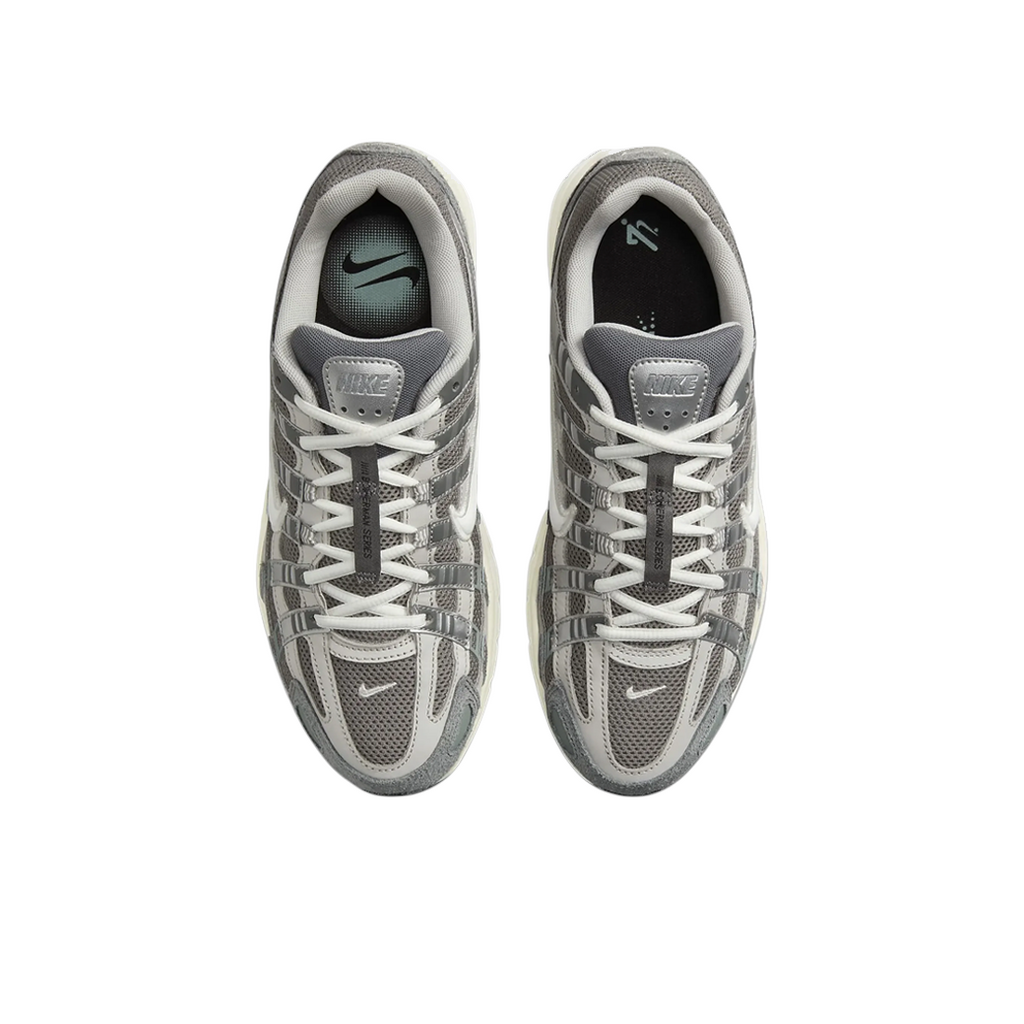 JeevzPlug Nike P-6000 Flat Pewter sneakers in grey mesh and metallic silver leather with cushioned white midsoles