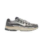 JeevzPlug Nike P-6000 Flat Pewter sneaker with grey mesh, metallic silver leather overlays, and suede accents.