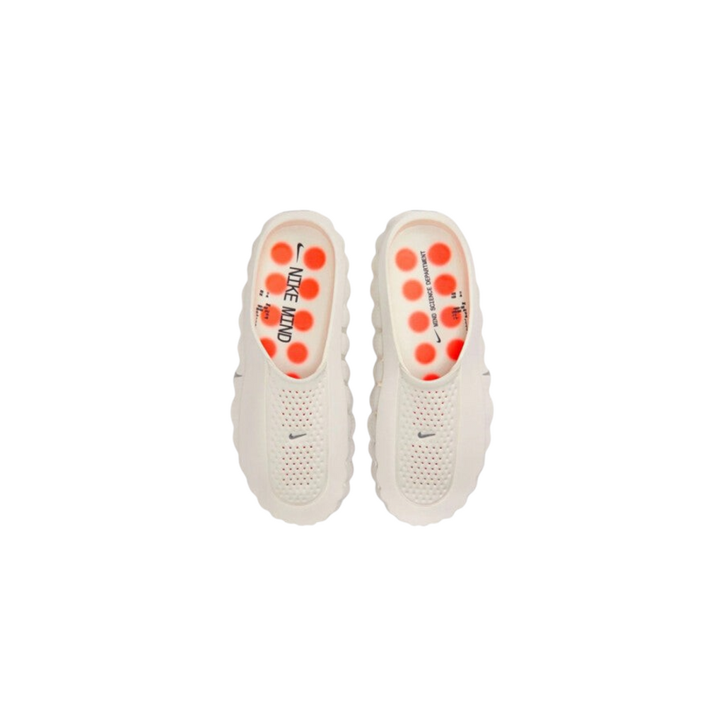 JeevzPlug Nike Mind 001 Slide in Light Bone with a perforated upper, contoured footbed, and orange circular accents.
