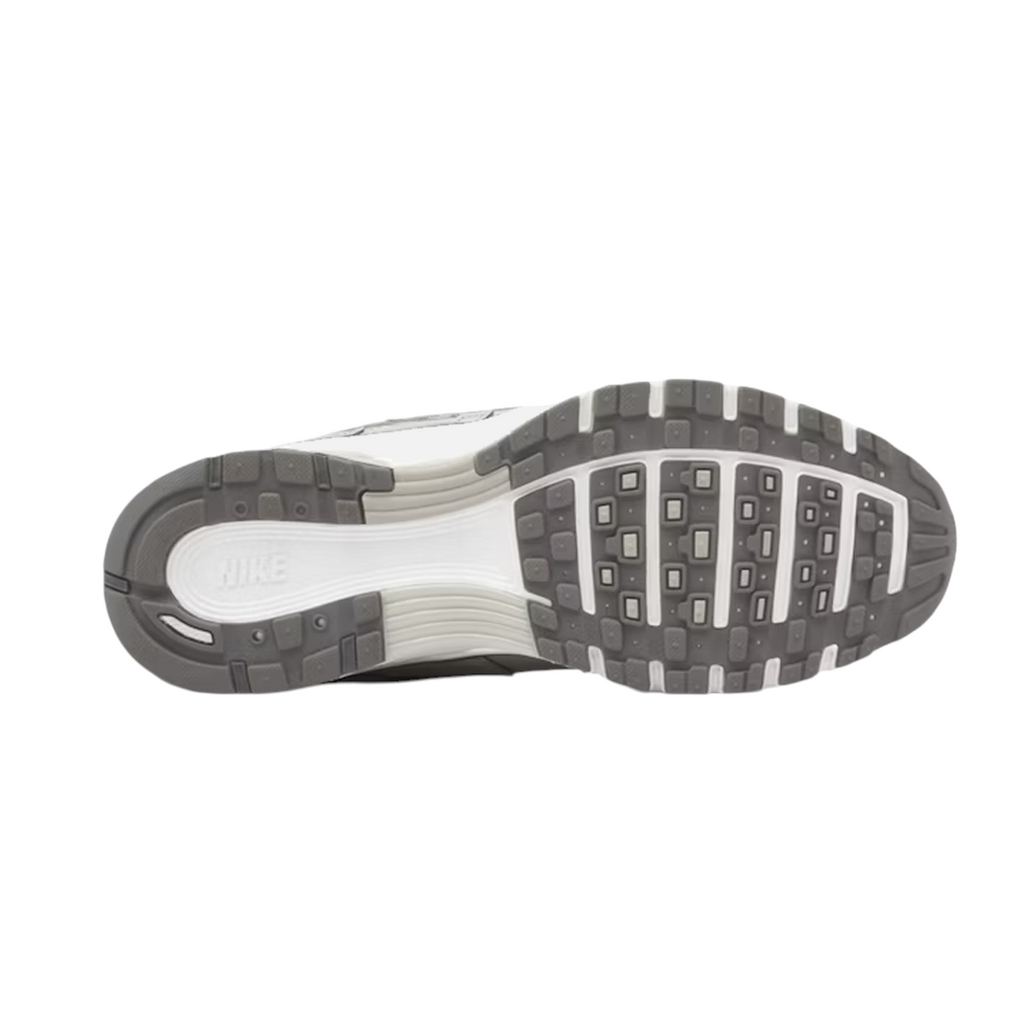 JeevzPlug Nike P-6000 Light Iron Ore sneaker outsole featuring a grey and white durable traction pattern