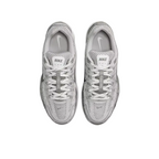 JeevzPlug Nike P-6000 Light Iron Ore sneakers featuring mesh and leather overlays in grey and metallic silver tones.