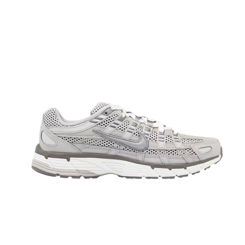 JeevzPlug Nike P-6000 Light Iron Ore sneaker with mesh and leather overlays and a metallic silver Swoosh