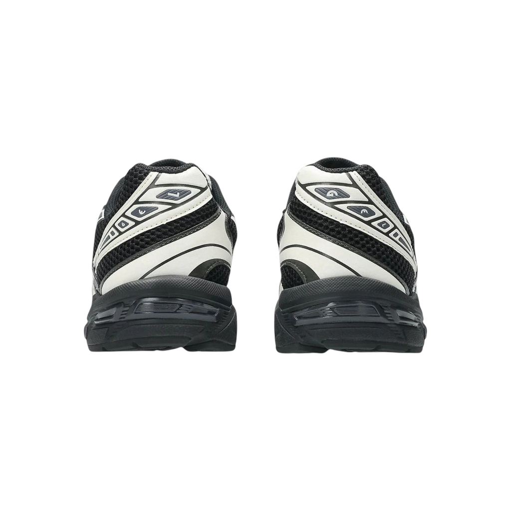 JeevzPlug ASICS Gel-1130 sneakers in black and cream, showing the rear view with mesh panels and GEL cushioning.