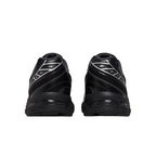 JeevzPlug ASICS Gel-1130 sneakers in black and pure silver from a rear view showing mesh and GEL cushioning details.
