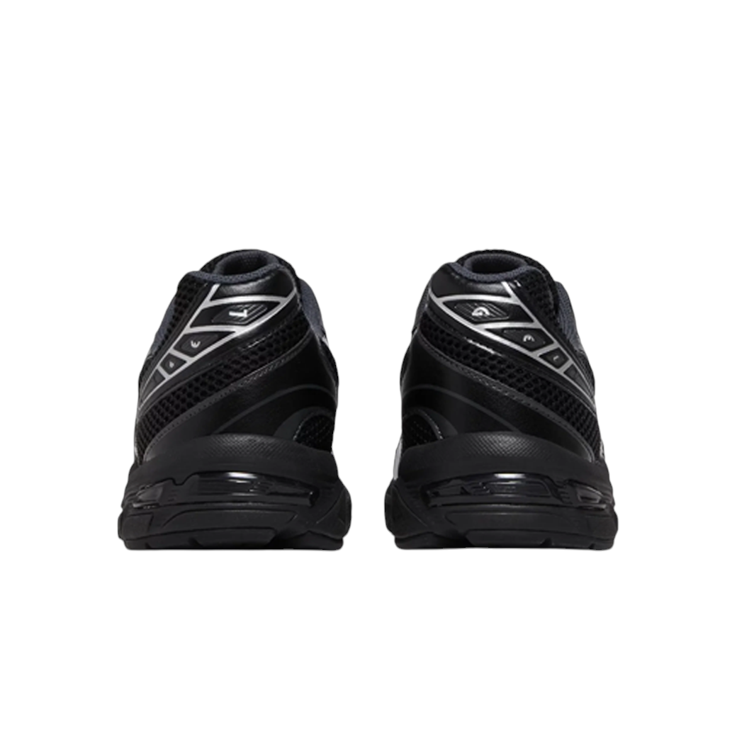 JeevzPlug ASICS Gel-1130 sneakers in black and pure silver from a rear view showing mesh and GEL cushioning details.
