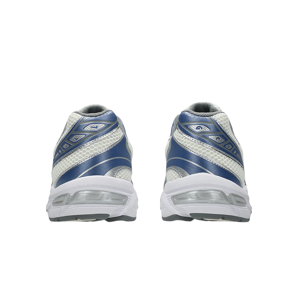 Rear view of JeevzPlug ASICS Gel-1130 Cream Blueberry sneakers showing mesh upper, blue leather overlays, and GEL sole.