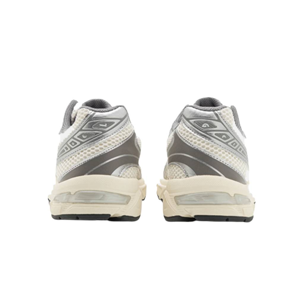 Rear view of JeevzPlug ASICS Gel-1130 women's sneakers in cream and clay grey with mesh and synthetic leather details.