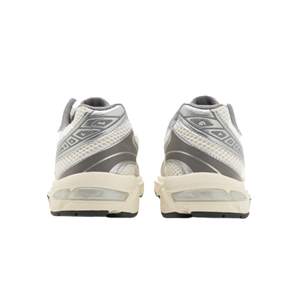 Rear view of JeevzPlug ASICS Gel-1130 women's sneakers in cream and clay grey with mesh and synthetic leather details.