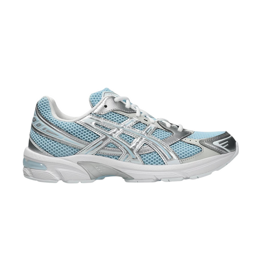 JeevzPlug ASICS Gel-1130 sneaker in faded denim blue mesh with metallic silver overlays and white GEL cushioning sole.