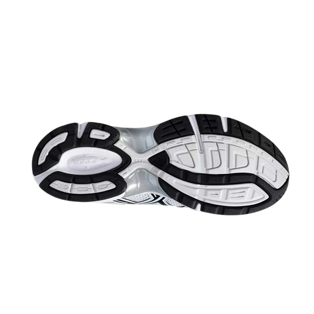 JeevzPlug ASICS Gel-1130 sneaker showing the black and white rubber outsole tread pattern and technical design
