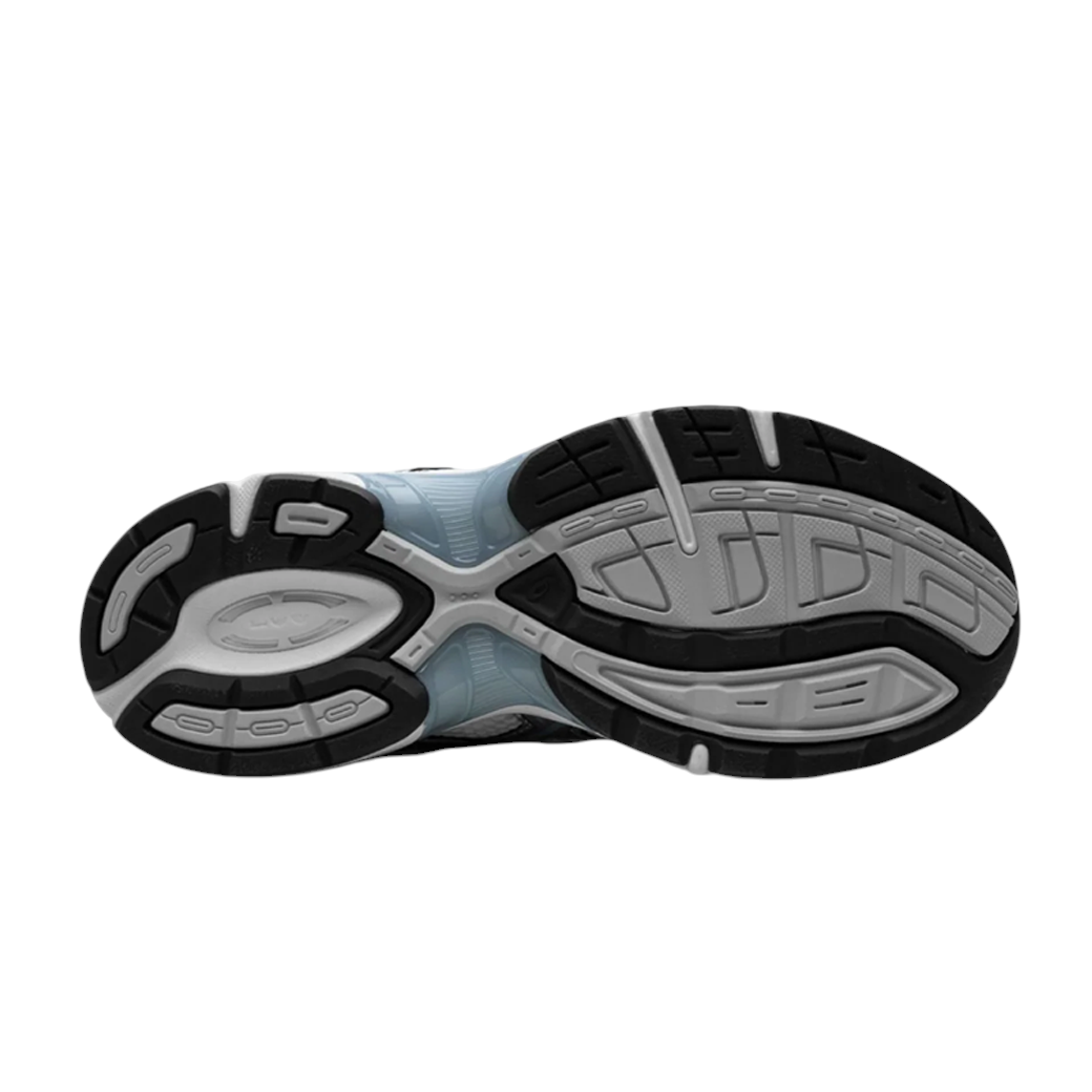 JeevzPlug ASICS Gel-1130 sneaker outsole in white, grey, and black with textured rubber traction pattern