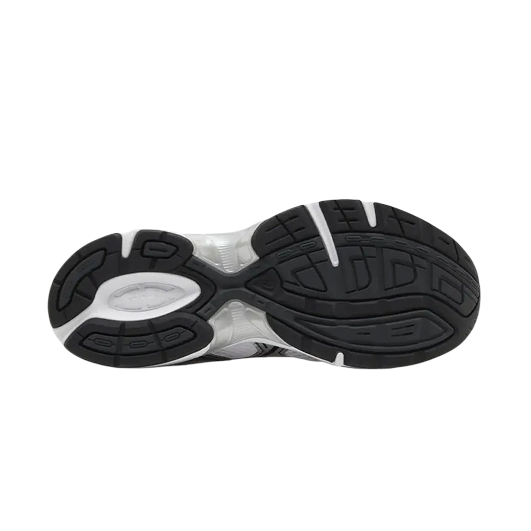 JeevzPlug ASICS Gel-1130 sneaker showing the black and white rubber outsole tread pattern