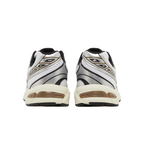 JeevzPlug ASICS Gel-1130 White Clay Canyon sneakers showing the rear view with silver accents and GEL cushioning