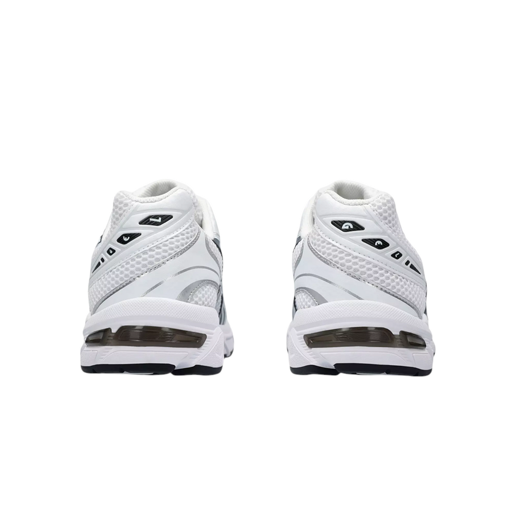 JeevzPlug ASICS Gel-1130 sneakers in white and black, showing the rear view with visible Gel heel cushioning.