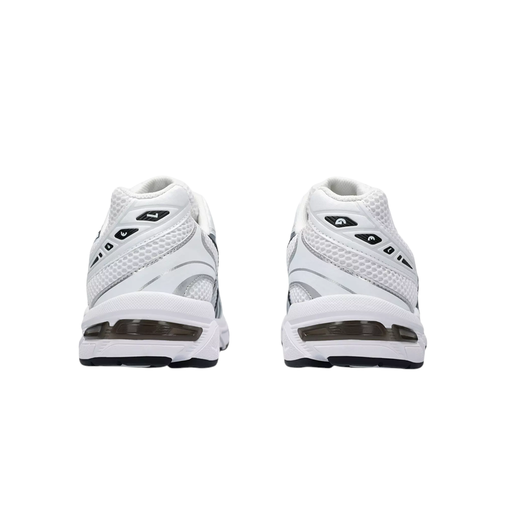 JeevzPlug ASICS Gel-1130 sneakers in white and black, showing the rear view with visible Gel heel cushioning.