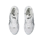JeevzPlug ASICS Gel-1130 sneakers in white and black with mesh upper and synthetic overlays, top-down view.