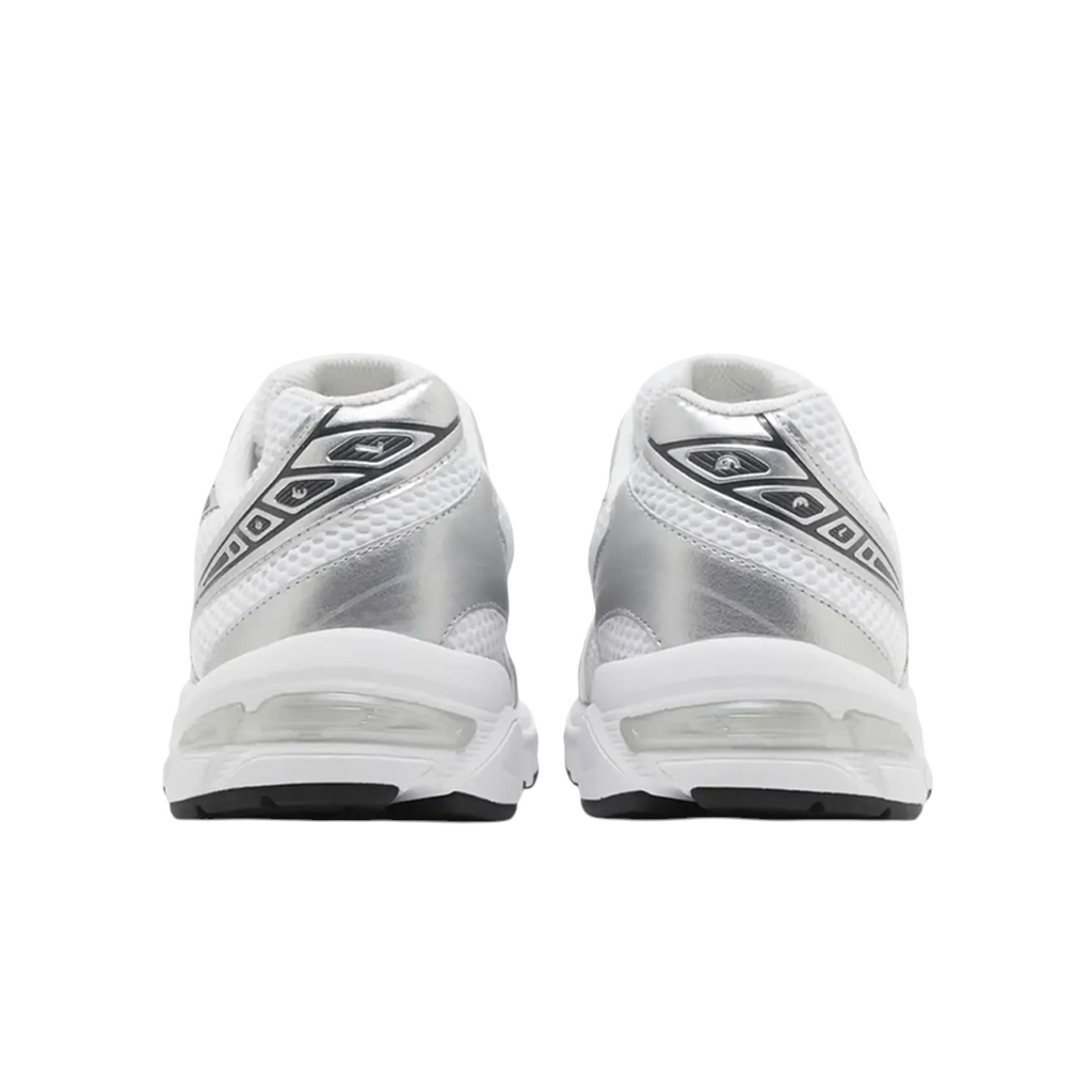 JeevzPlug ASICS Gel-1130 sneakers in white and pure silver, showing a rear view of the retro mesh and leather design.