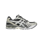 JeevzPlug ASICS Gel-Kayano 14 sneakers in obsidian black and cement grey with layered mesh and synthetic panels.