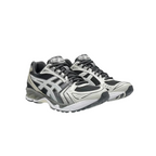 JeevzPlug ASICS Gel-Kayano 14 sneakers in obsidian black and cement grey with layered mesh and synthetic panels.