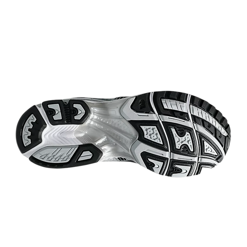 JeevzPlug ASICS Gel-Kayano 14 Fjord Grey sneaker showing the durable black and white rubber outsole tread pattern
