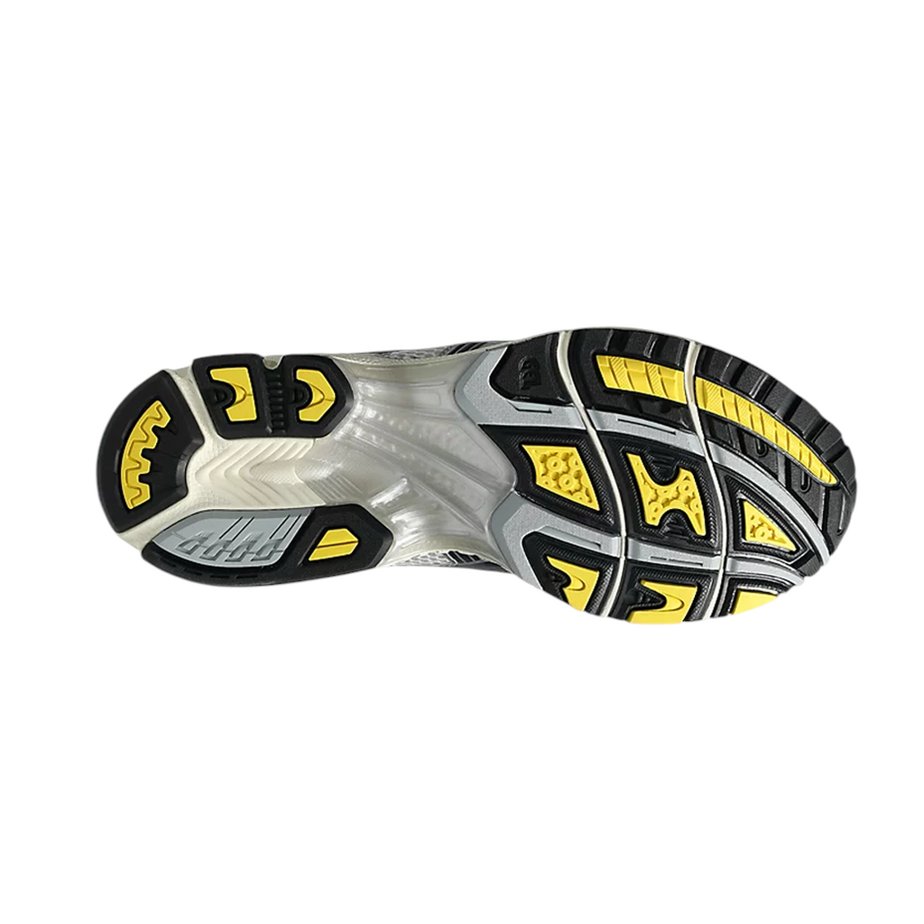JeevzPlug JJJJound x ASICS Gel-Kayano 14 sneaker outsole featuring yellow and black traction patterns on white base