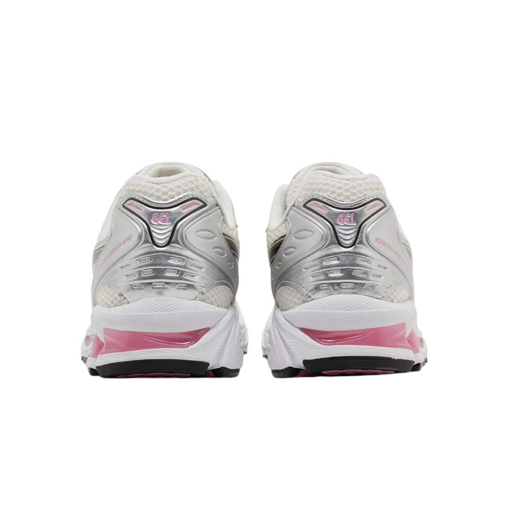 JeevzPlug ASICS Gel-Kayano 14 Sweet Pink sneakers showing the rear view with metallic silver and pink accents.
