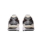 JeevzPlug ASICS Gel-Kayano 14 sneakers in cream, black, and metallic plum, rear view showing heel cushioning detail.