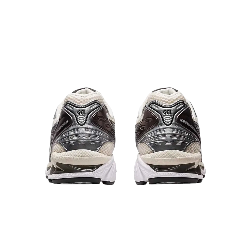 JeevzPlug ASICS Gel-Kayano 14 sneakers in cream, black, and metallic plum, rear view showing heel cushioning detail.