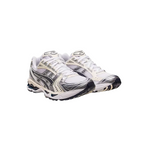 JeevzPlug ASICS Gel-Kayano 14 sneakers in white and midnight navy with metallic silver overlays and mesh upper.
