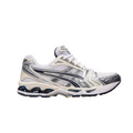JeevzPlug ASICS Gel-Kayano 14 sneaker in white and midnight navy with metallic silver accents and mesh upper.