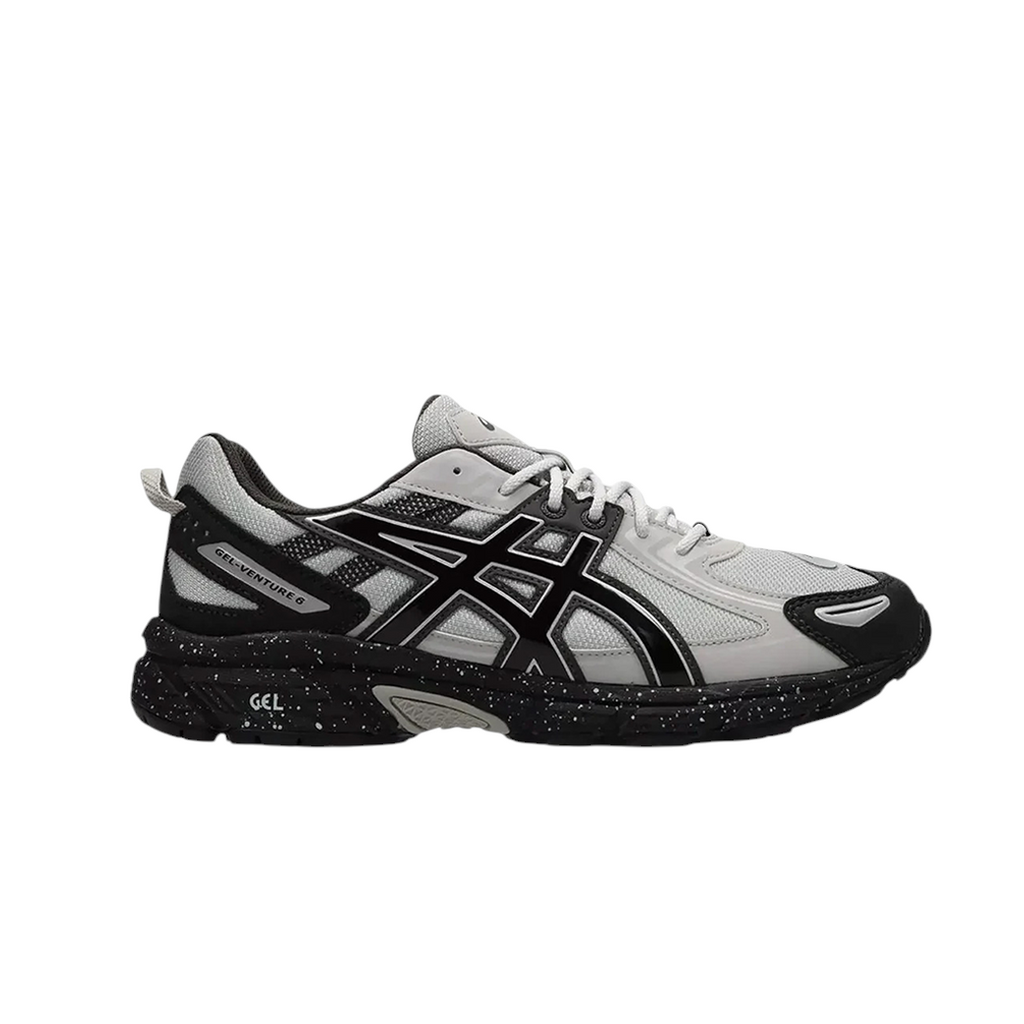 JeevzPlug ASICS Gel-Venture 6 trail running shoe in glacier grey and black with a speckled midsole and mesh upper.