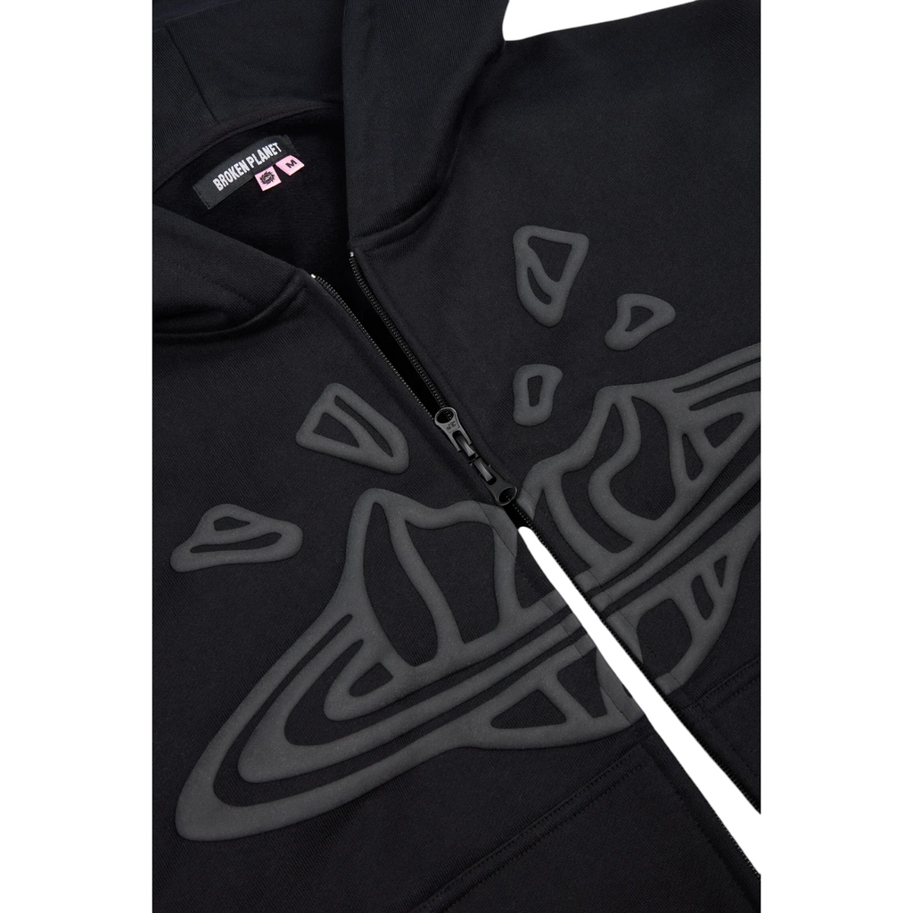 JeevzPlug Broken Planet zip-up hoodie in midnight black with embossed graphic detail and full zip closure
