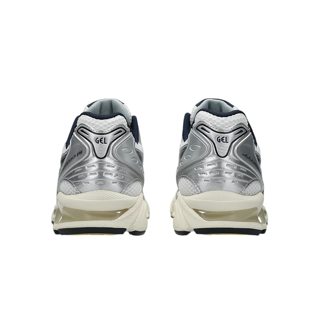 Rear view of JeevzPlug JJJJound x ASICS Gel-Kayano 14 White Midnight sneakers showing metallic silver heel details