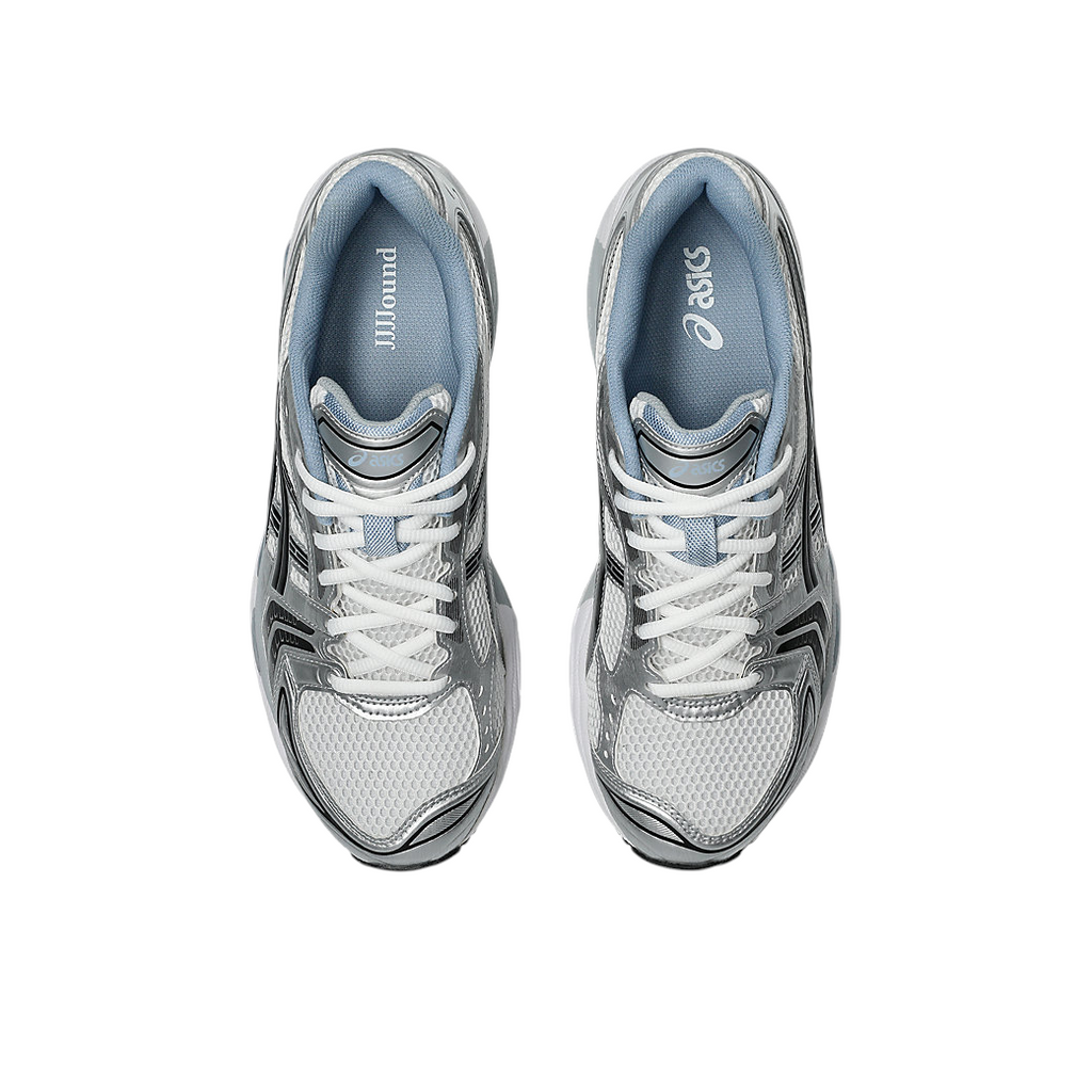 JeevzPlug JJJJound x ASICS Gel-Kayano 14 sneakers in white, metallic silver, and baby blue, top-down view.