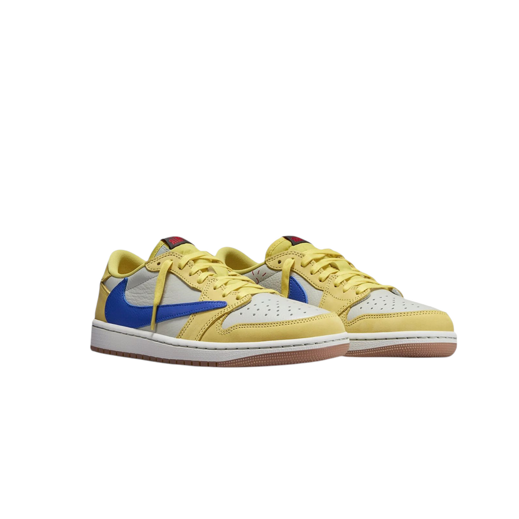 JeevzPlug Jordan 1 Low Travis Scott Canary sneakers featuring a yellow and white upper with a blue reverse Swoosh.