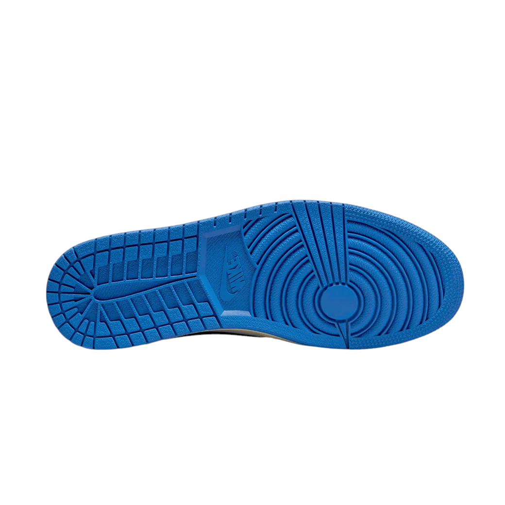 JeevzPlug Nike Air Jordan 1 Low Travis Scott Fragment sneaker showing the bright blue rubber outsole tread pattern.