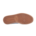 JeevzPlug Nike Air Jordan 1 x Travis Scott Canary sneaker showing the gum medium brown rubber outsole tread pattern