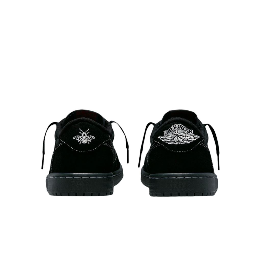 JeevzPlug Nike Air Jordan 1 Low Travis Scott Black Phantom sneakers showing mismatched bee and Wings logo heel embroidery