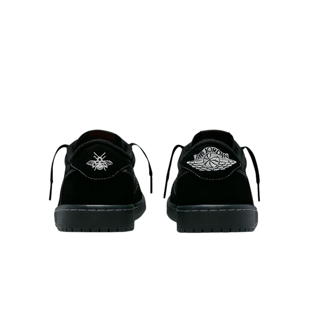 JeevzPlug Nike Air Jordan 1 Low Travis Scott Black Phantom sneakers showing mismatched bee and Wings logo heel embroidery